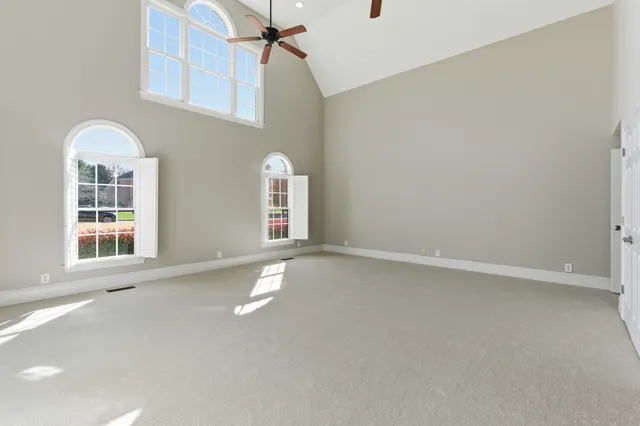 an empty room with windows