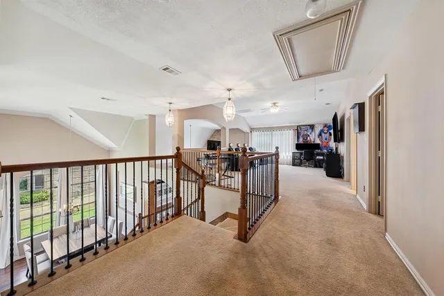 a view of a hallway with workspace