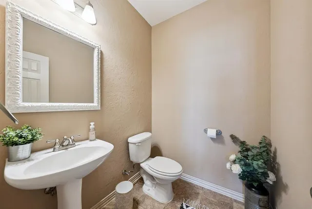 a patio with table and chairs