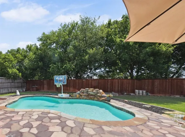 a garden view with a seating space