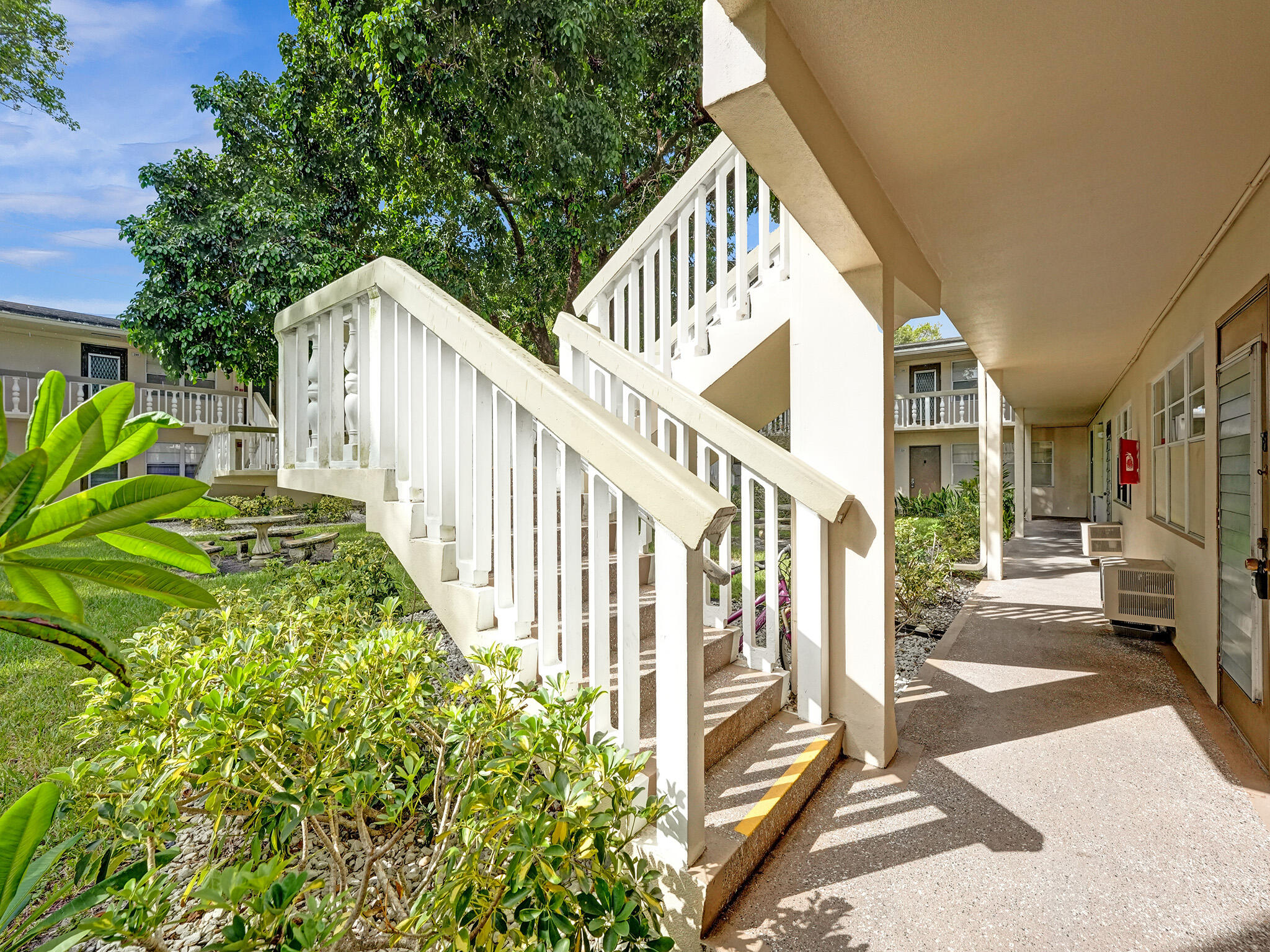 232 Farnham J, Unit 232 Deerfield Beach, FL 33442 - Photo 2 of 38 a view of entryway with patio
