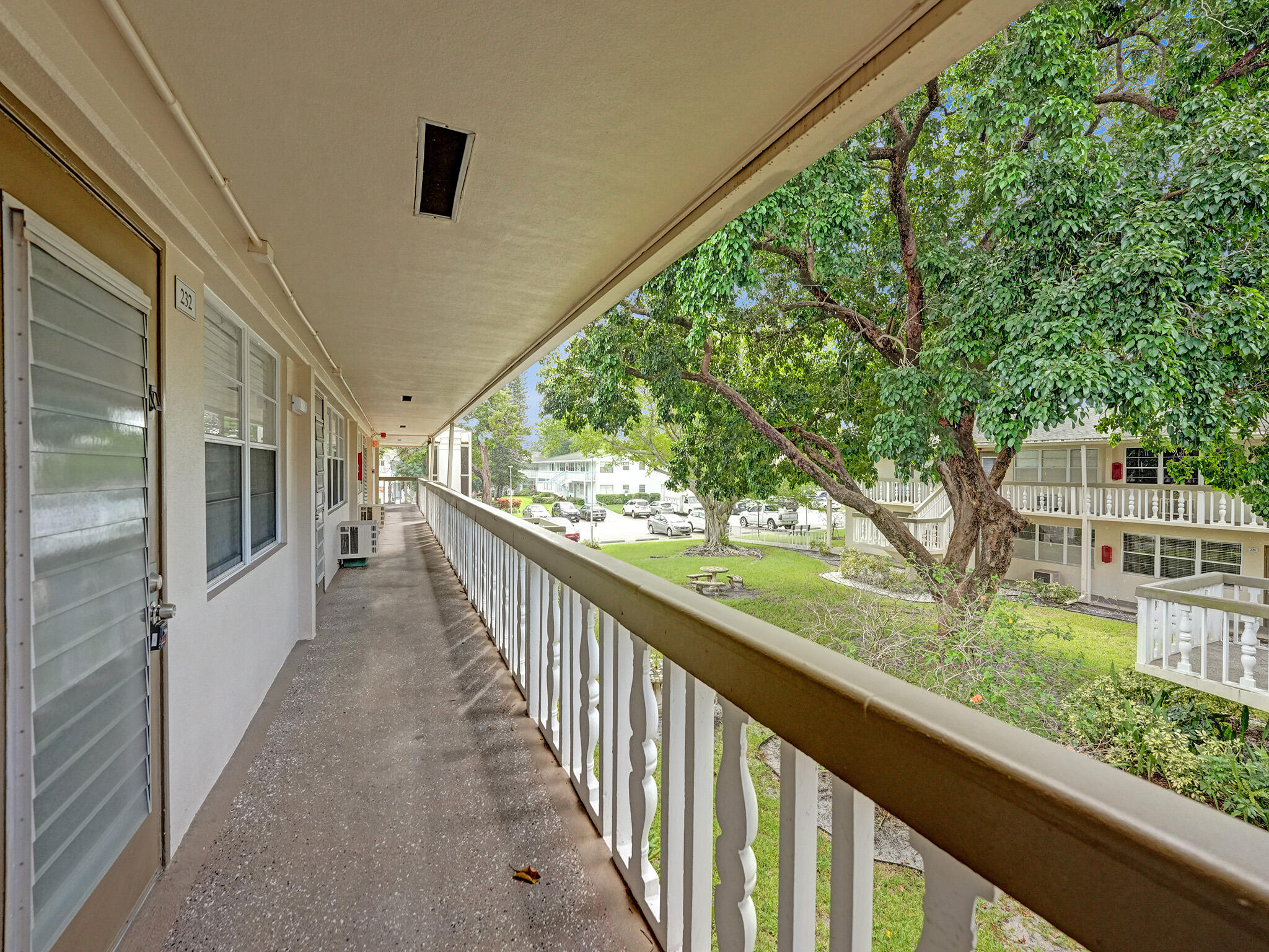 232 Farnham J, Unit 232 Deerfield Beach, FL 33442 - Photo 36 of 38 a view of a porch