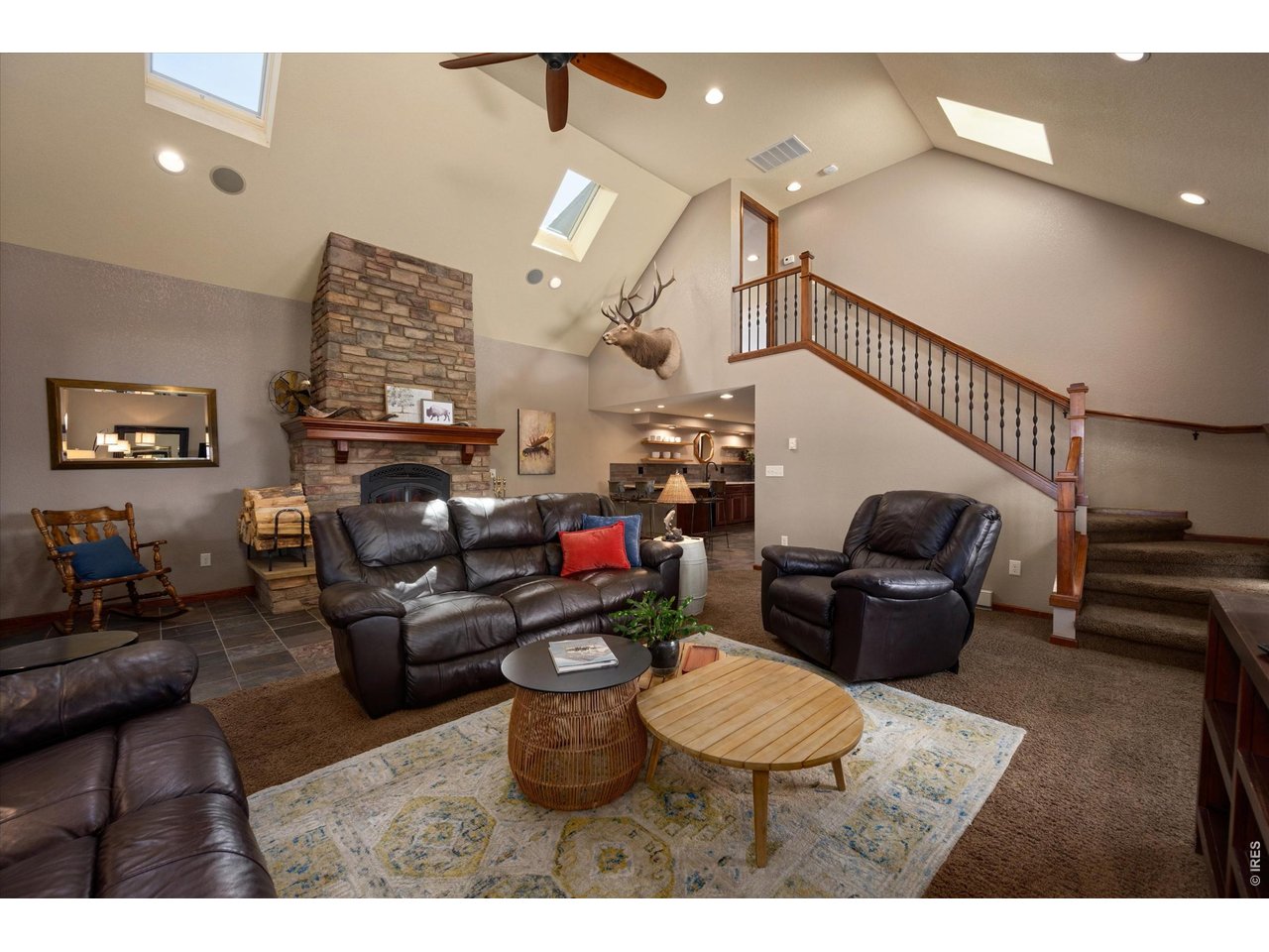 7600 Rita Lane Fort Collins, CO 80524 - Photo 19 of 50 Family Room with Vaulted Ceiling and 2nd Upstairs Access Point