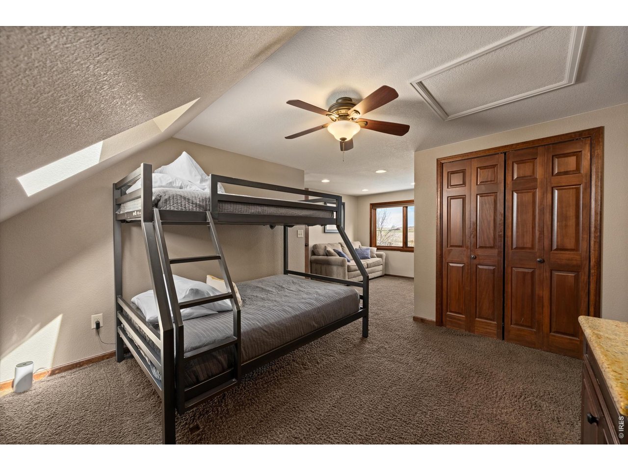 7600 Rita Lane Fort Collins, CO 80524 - Photo 30 of 50 Bedroom 5 with Sitting Area or Room for More Bunk Beds