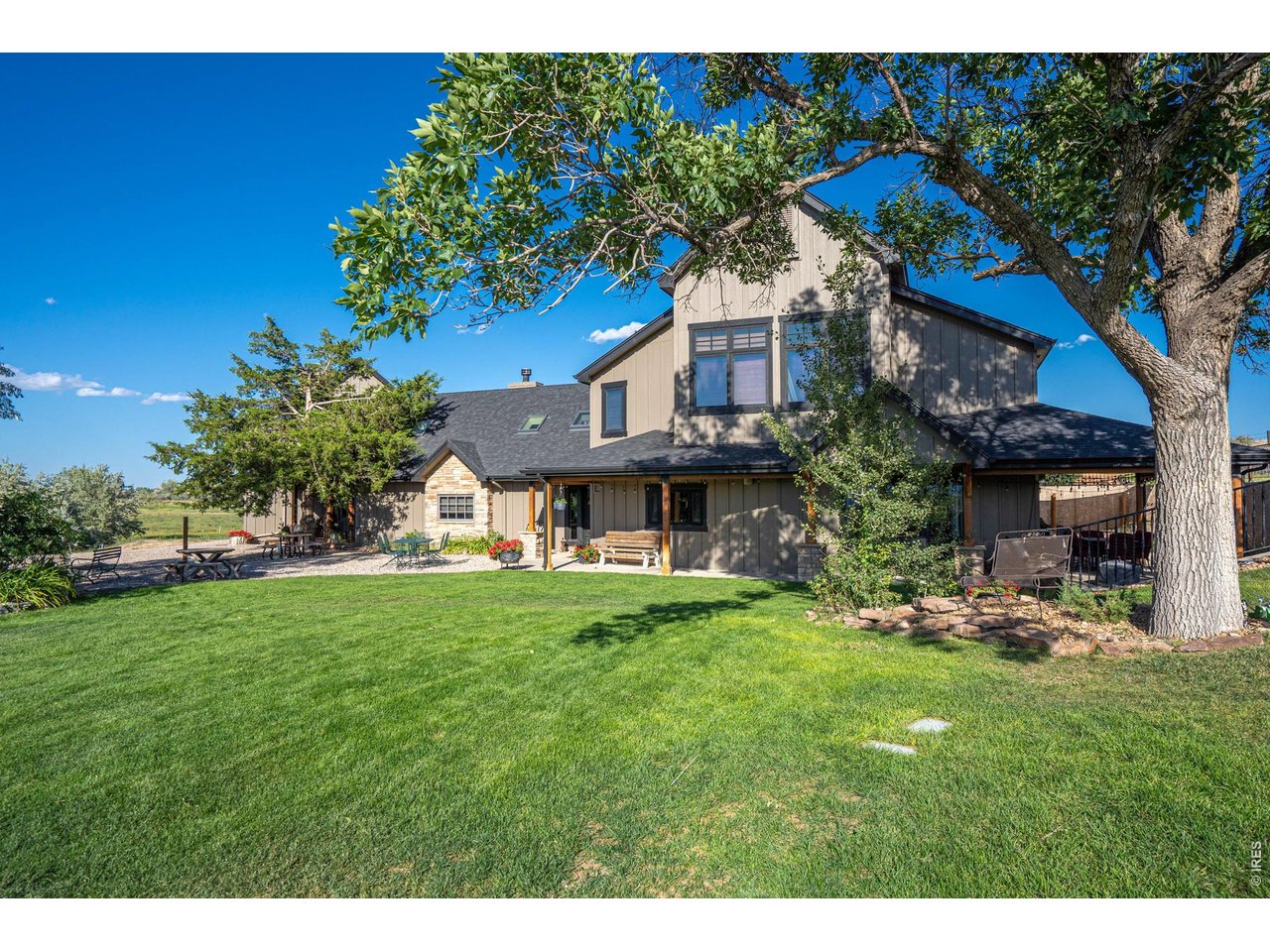 7600 Rita Lane Fort Collins, CO 80524 - Photo 9 of 50 Plenty of Lush Lawn Watered by the Well, so No Huge Water Bills!