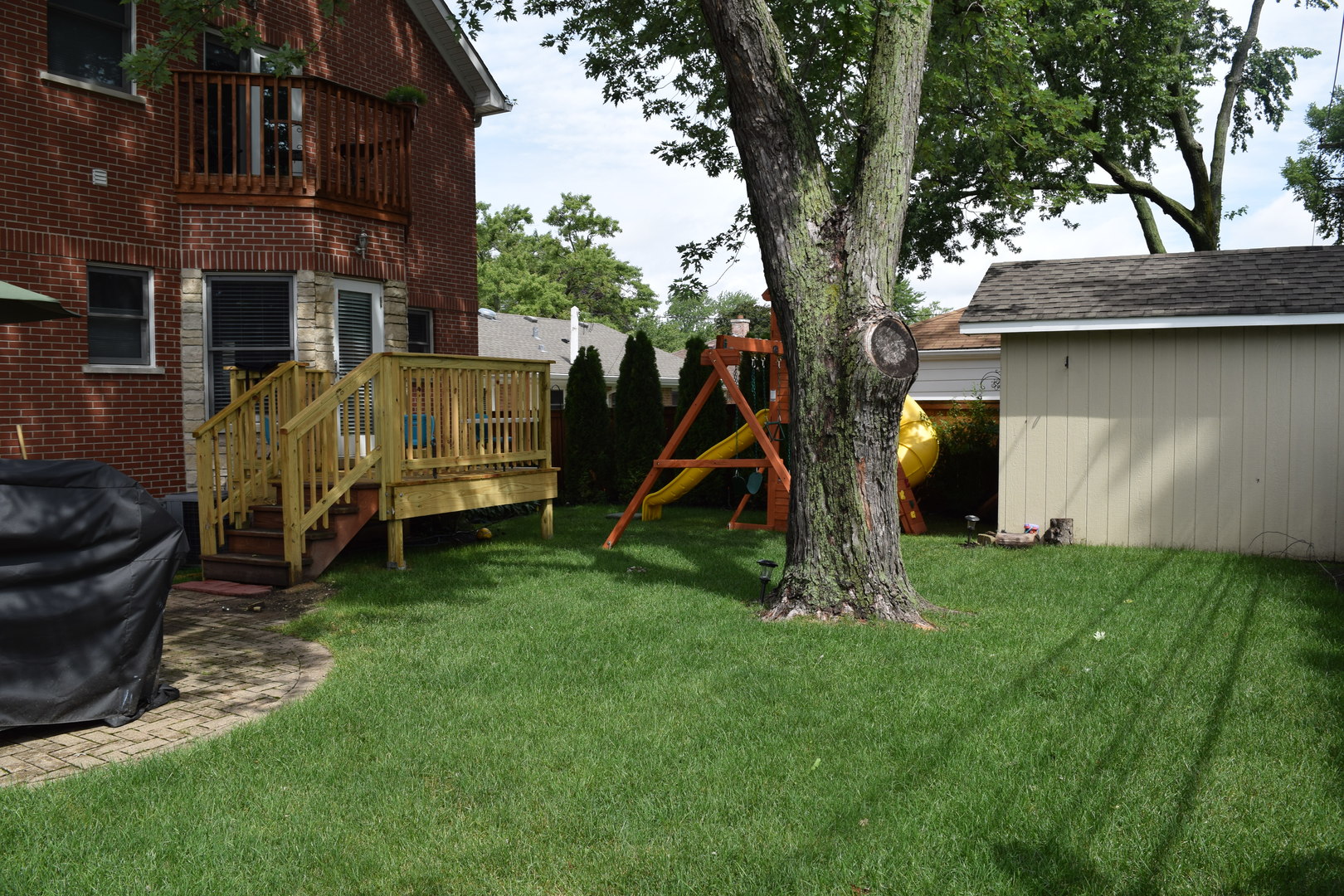 707 North Delphia Avenue Park Ridge, IL 60068 - Photo 16 of 22 a view of a backyard with a tree