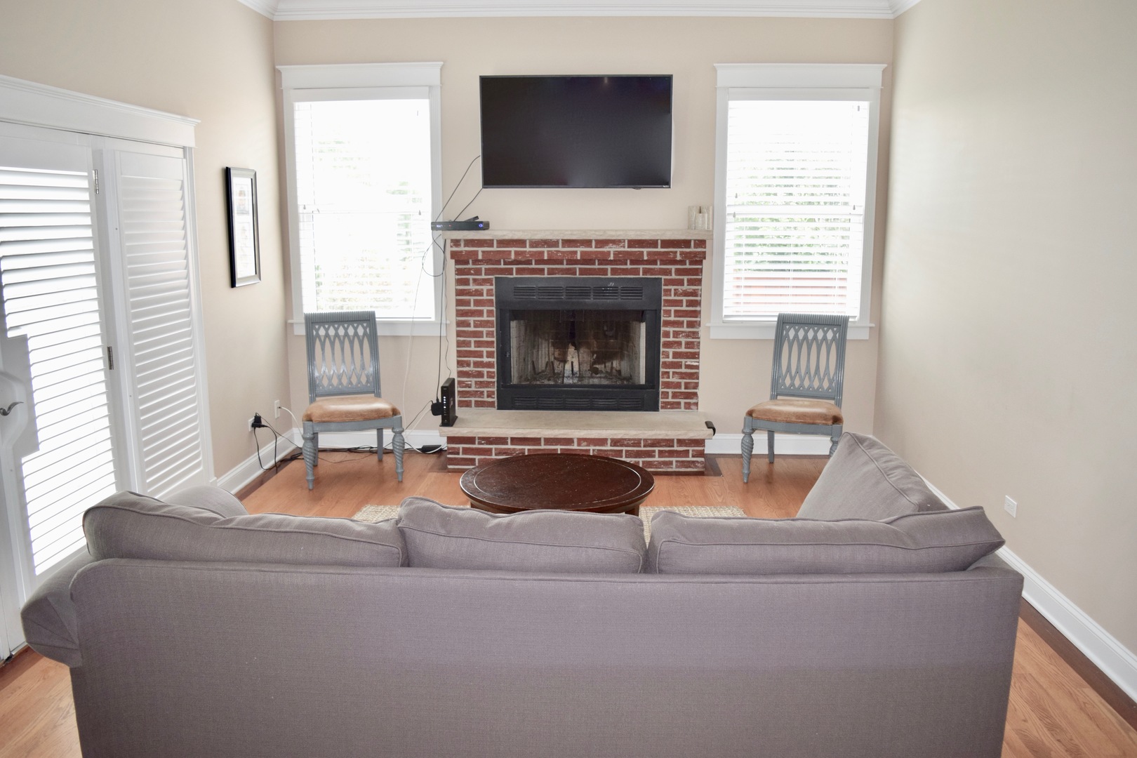 707 North Delphia Avenue Park Ridge, IL 60068 - Photo 7 of 22 a living room with furniture and a fireplace