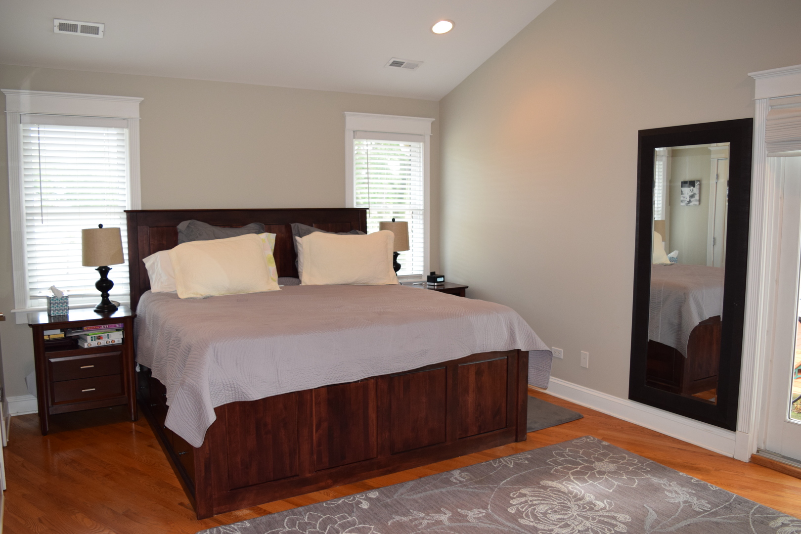 707 North Delphia Avenue Park Ridge, IL 60068 - Photo 9 of 22 a bedroom with a bed and a mirror
