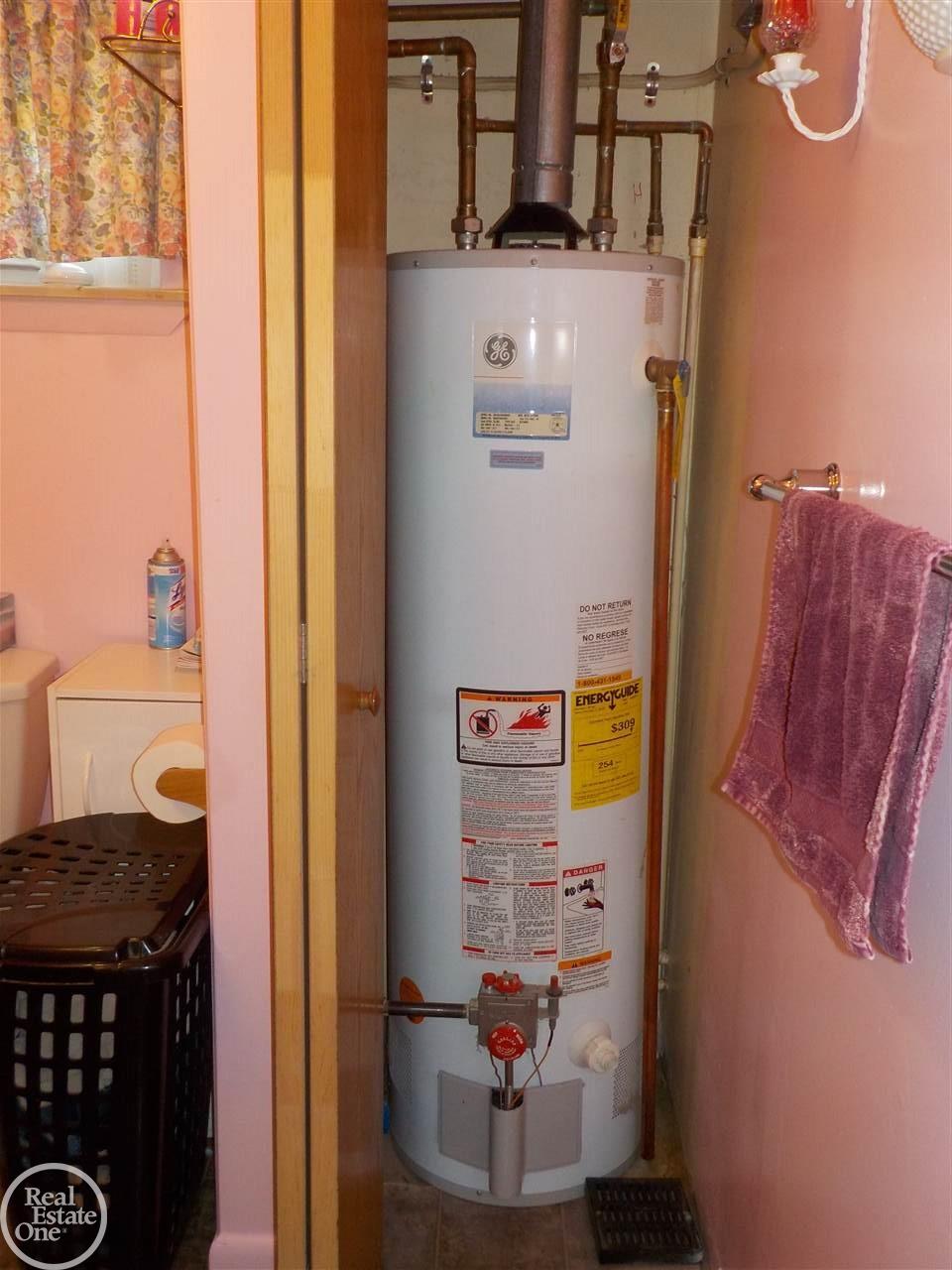 4077 Elbow Lake Road Prescott, MI 48756 - Photo 12 of 33 water heater in bathroom
