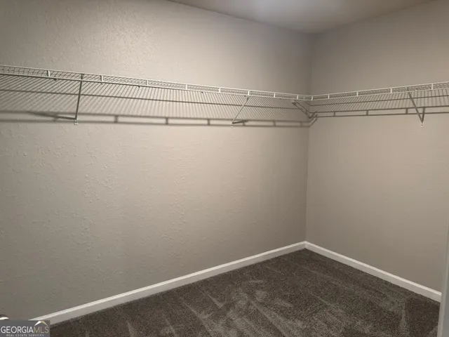 a view of a room with racks on the wall