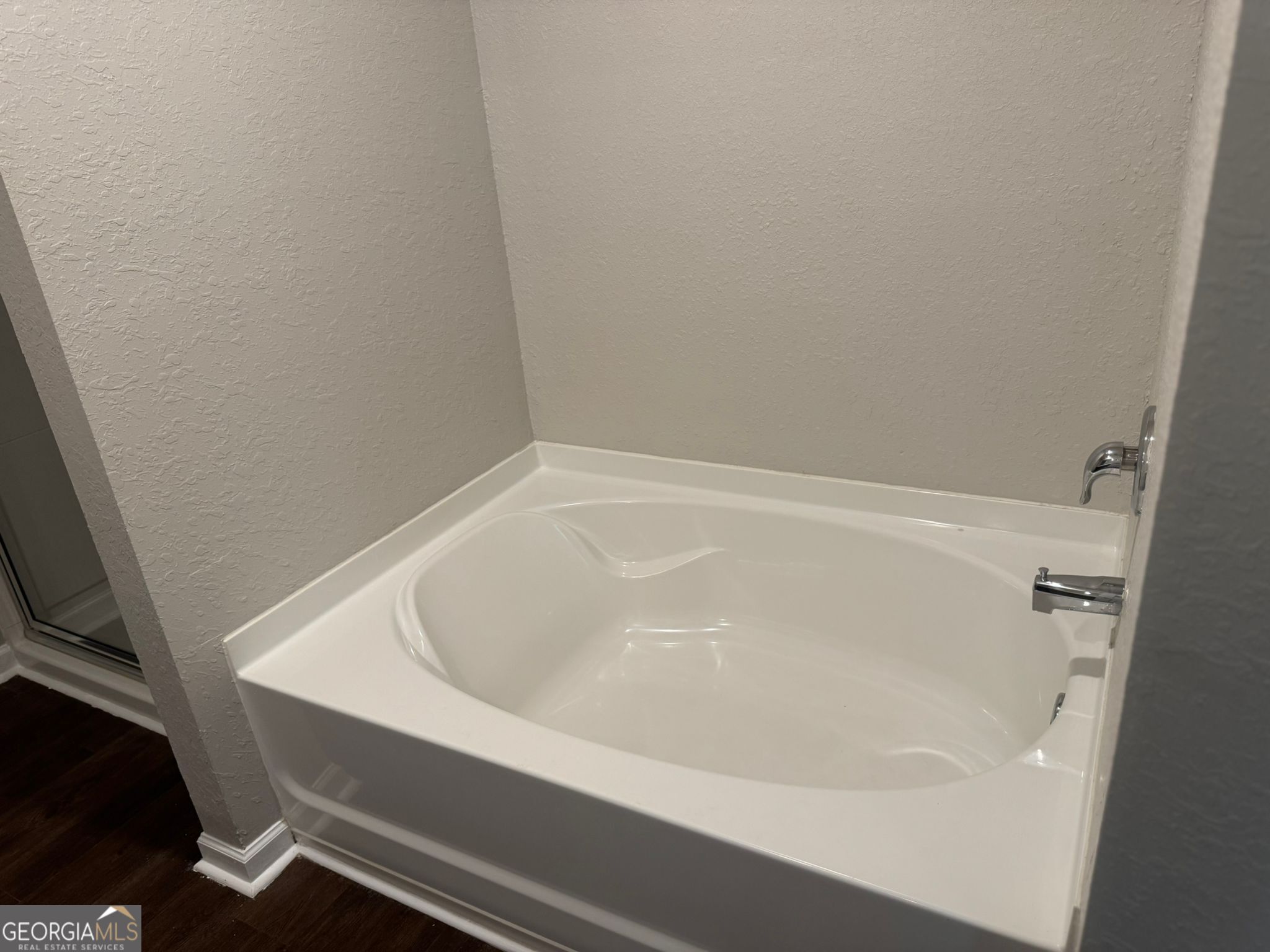 3475 Ridge Hill Parkway Douglasville, GA 30135 - Photo 19 of 34 a close up of a bathtub