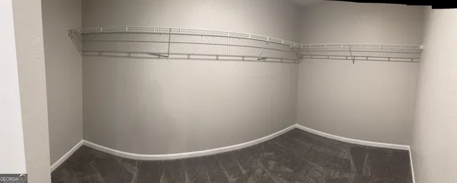 a view of a room with racks on the wall