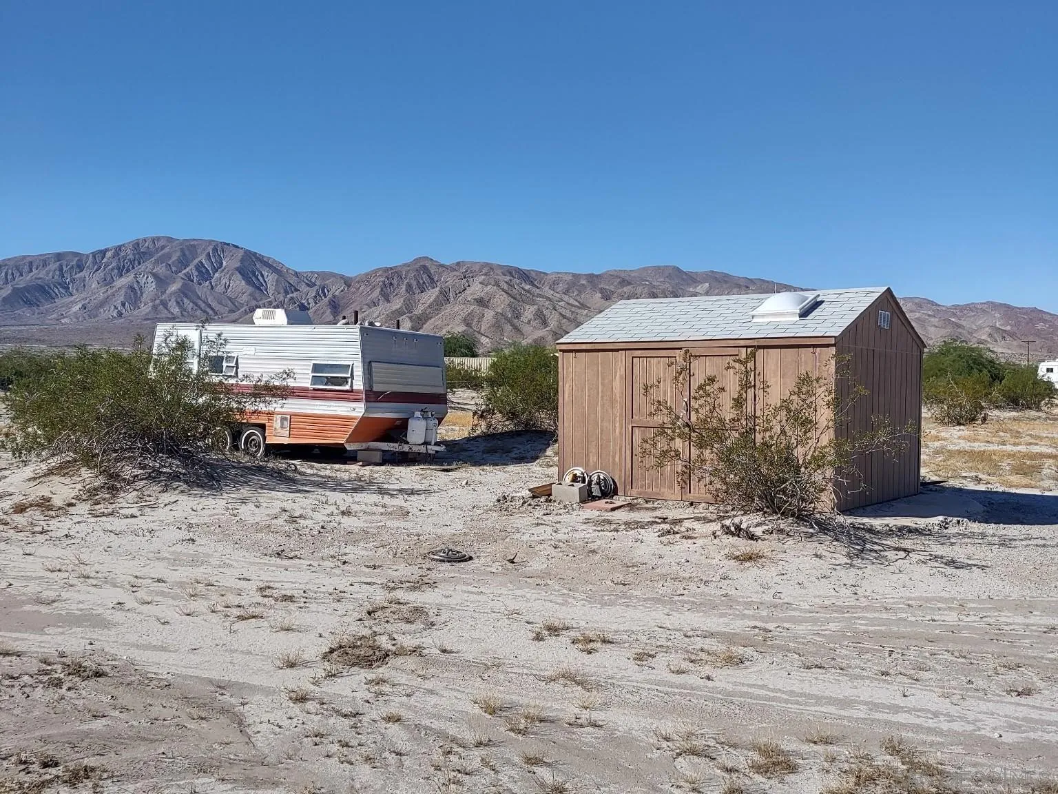 Split Mountain Road, Unit 40 Borrego Springs, CA 92004 - Photo 5 of 16 a front view of a house with a yard