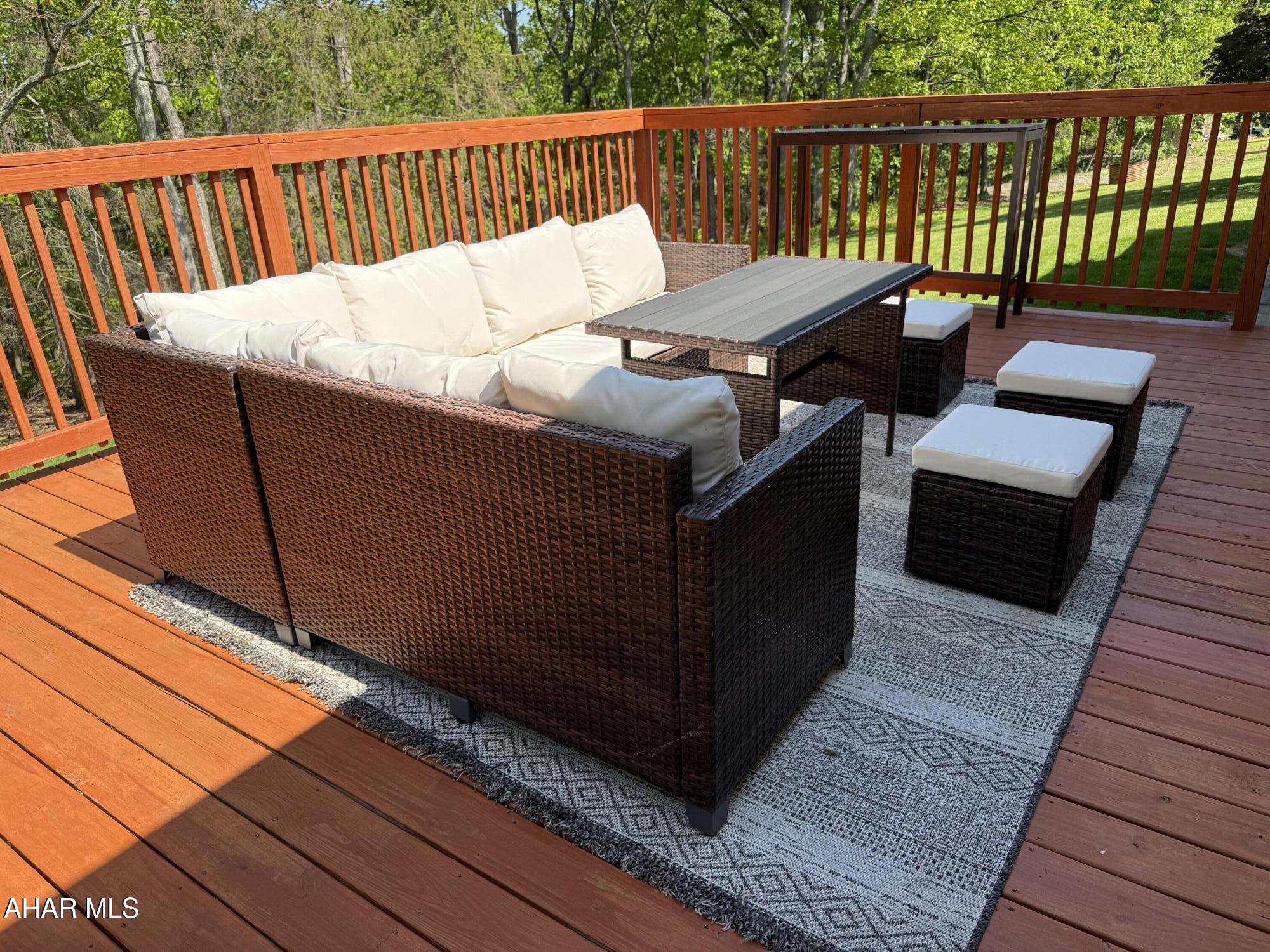 473 Calhoun Road Everett, PA 15537 - Photo 17 of 45 a view of a wooden chairs on the roof deck