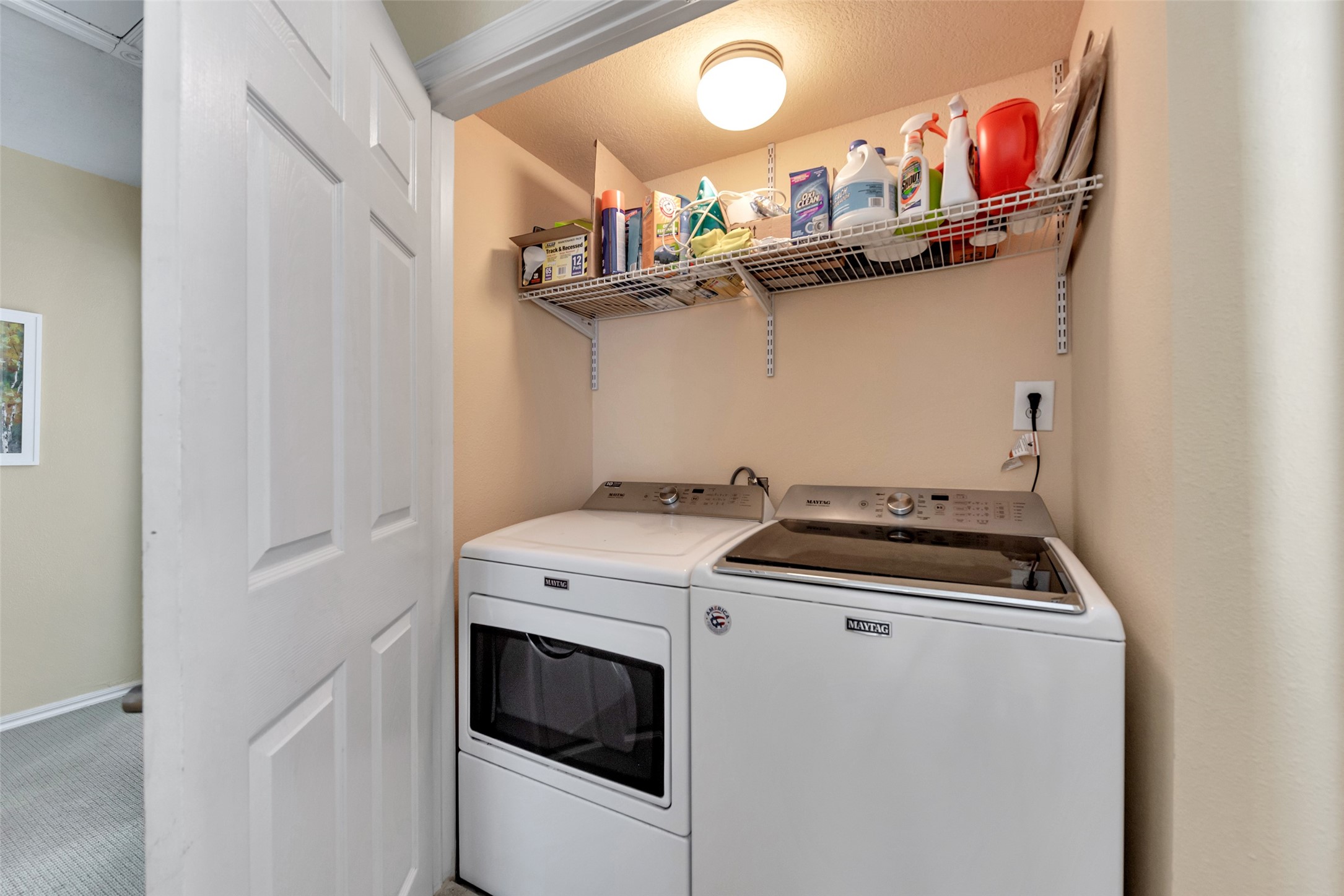247 Isles End Road Tiki Island, TX 77554 - Photo 17 of 48 a kitchen with a stove and a microwave