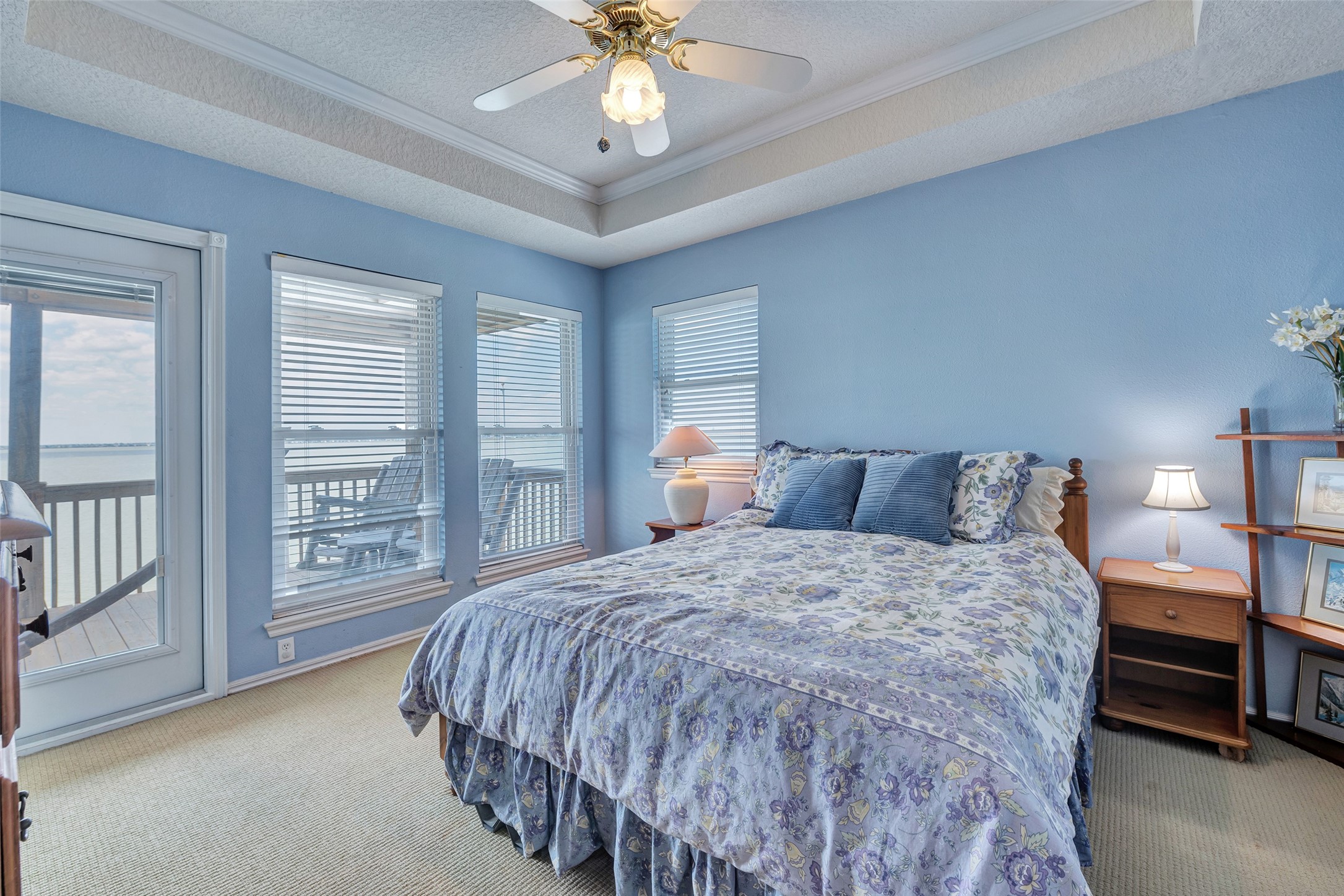 247 Isles End Road Tiki Island, TX 77554 - Photo 20 of 48 a bedroom with bed and window