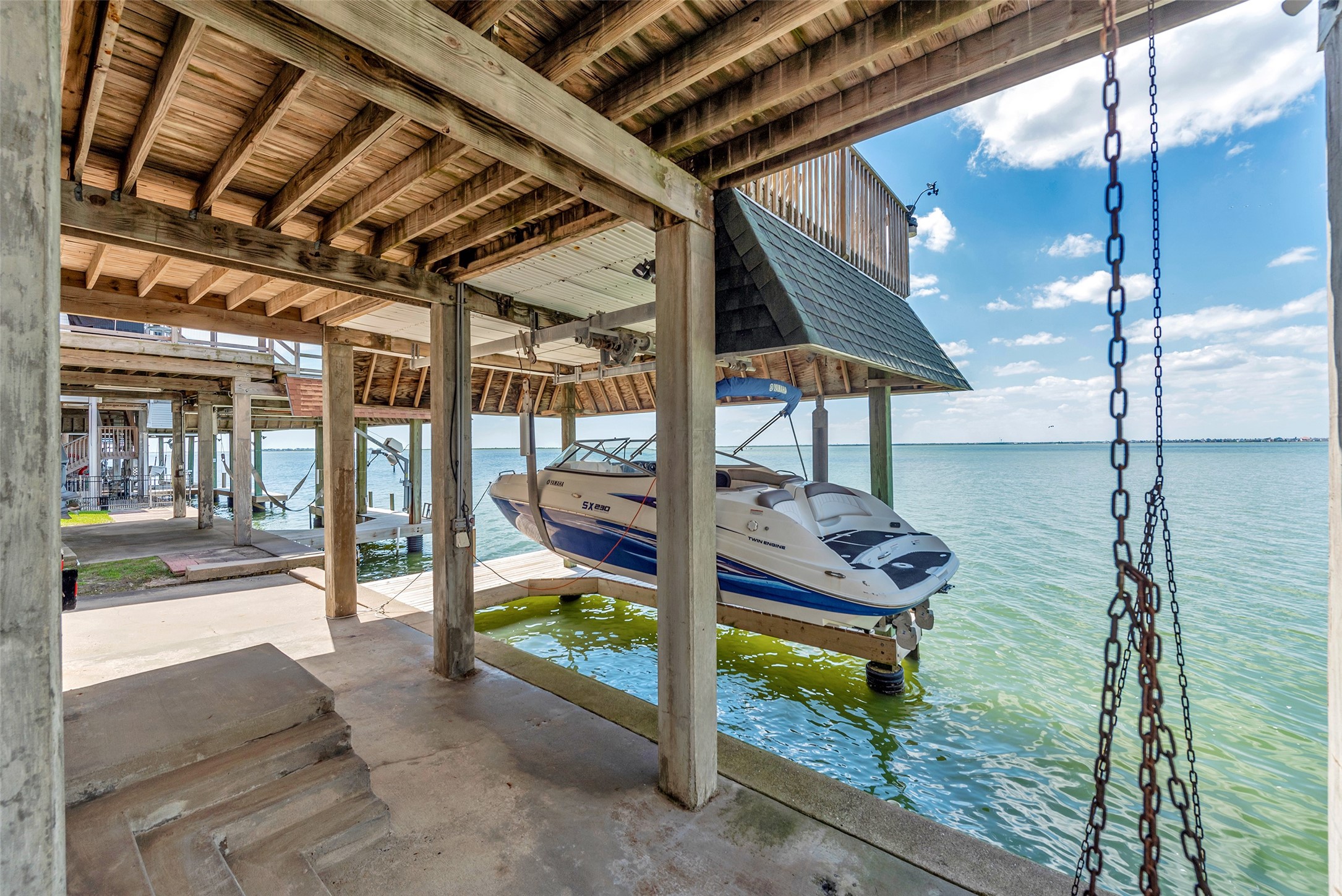 247 Isles End Road Tiki Island, TX 77554 - Photo 29 of 48 a view of a porch with a couch