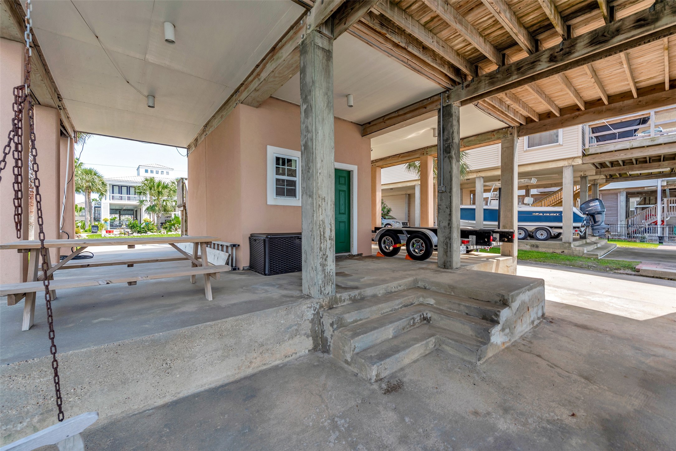 247 Isles End Road Tiki Island, TX 77554 - Photo 34 of 48 Ground level includes a storage unit for your gear and outdoor essentials.