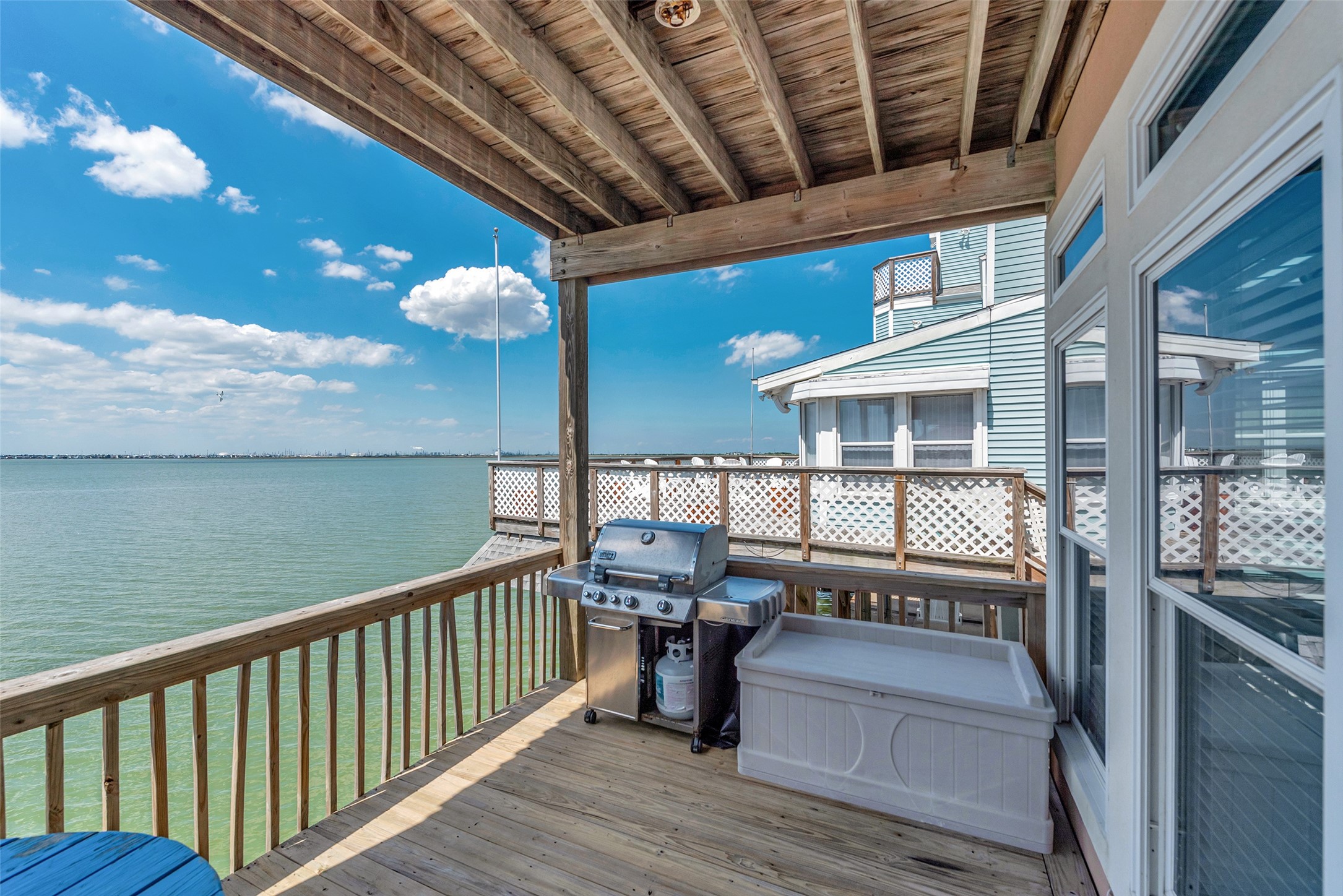 247 Isles End Road Tiki Island, TX 77554 - Photo 36 of 48 a view of a balcony with furniture