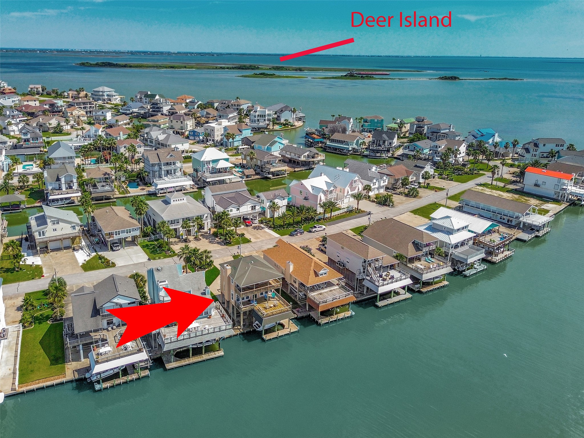 247 Isles End Road Tiki Island, TX 77554 - Photo 40 of 48 This home is perfectly situated right on the water, offering direct views across the bay and near Deer Island with convenient access to the Causeway.