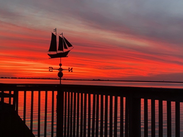 247 Isles End Road Tiki Island, TX 77554 - Photo 44 of 48 Tucked Away for Maximum Privacy – Located at the quiet end of Tiki Island, this bayfront home offers peaceful living, stunning sunsets, and water views.