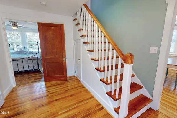 a view of entryway with wooden floor