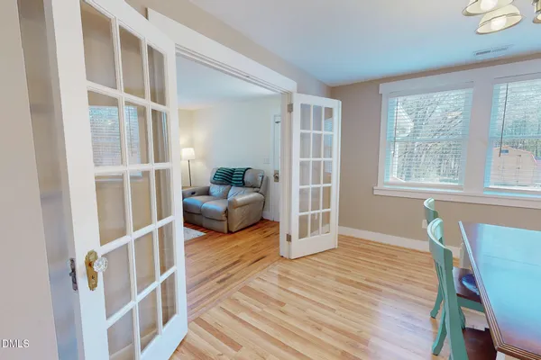 a view of a livingroom with furniture and wooden floor