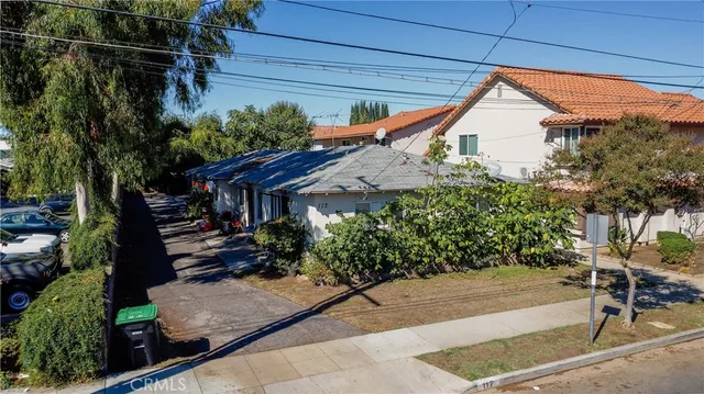 a house view with a garden space