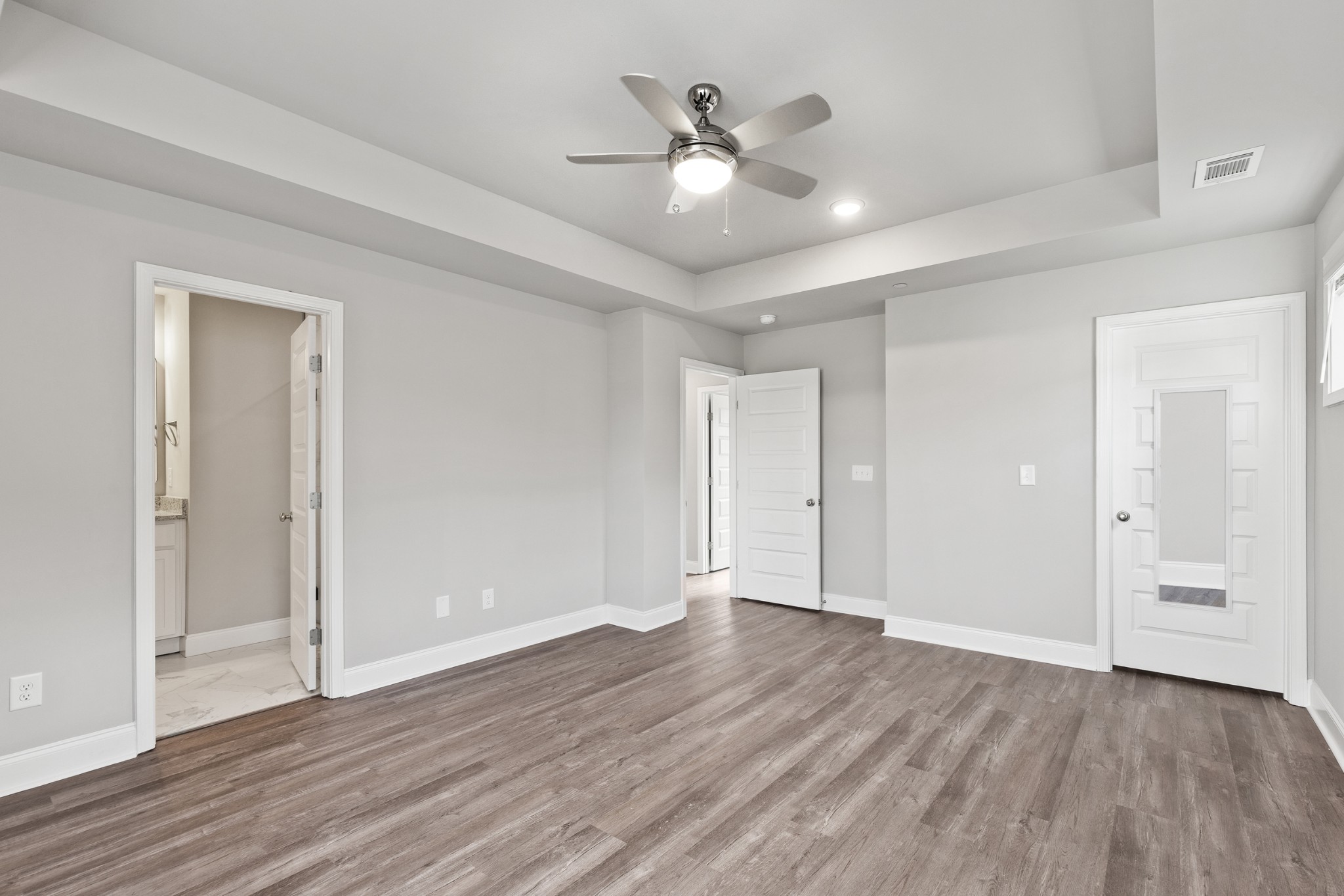 232 Franklin Street Pleasant View, TN 37146 - Photo 24 of 49 a view of an empty room with wooden floor