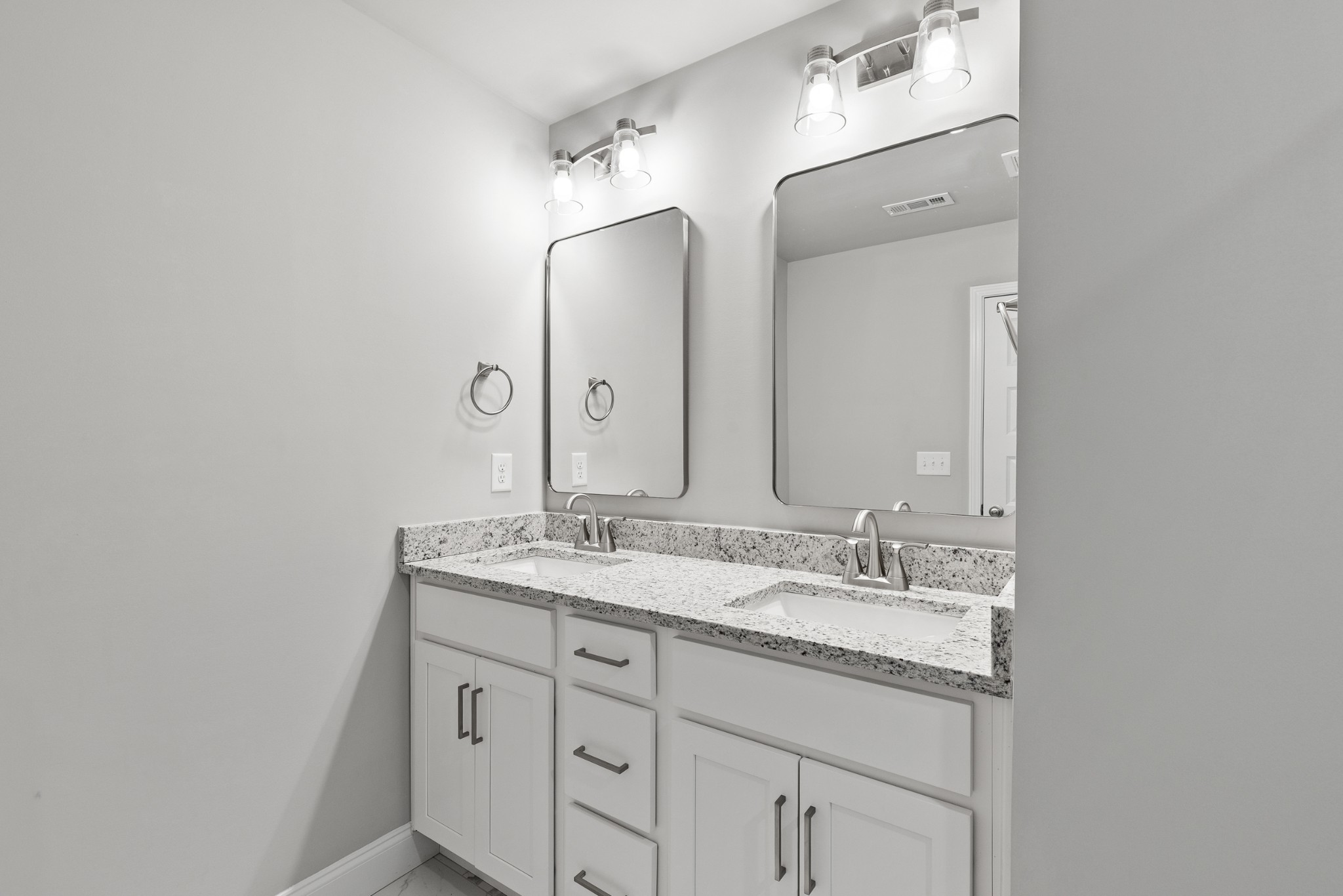232 Franklin Street Pleasant View, TN 37146 - Photo 26 of 49 a bathroom with a granite countertop sink double and mirror