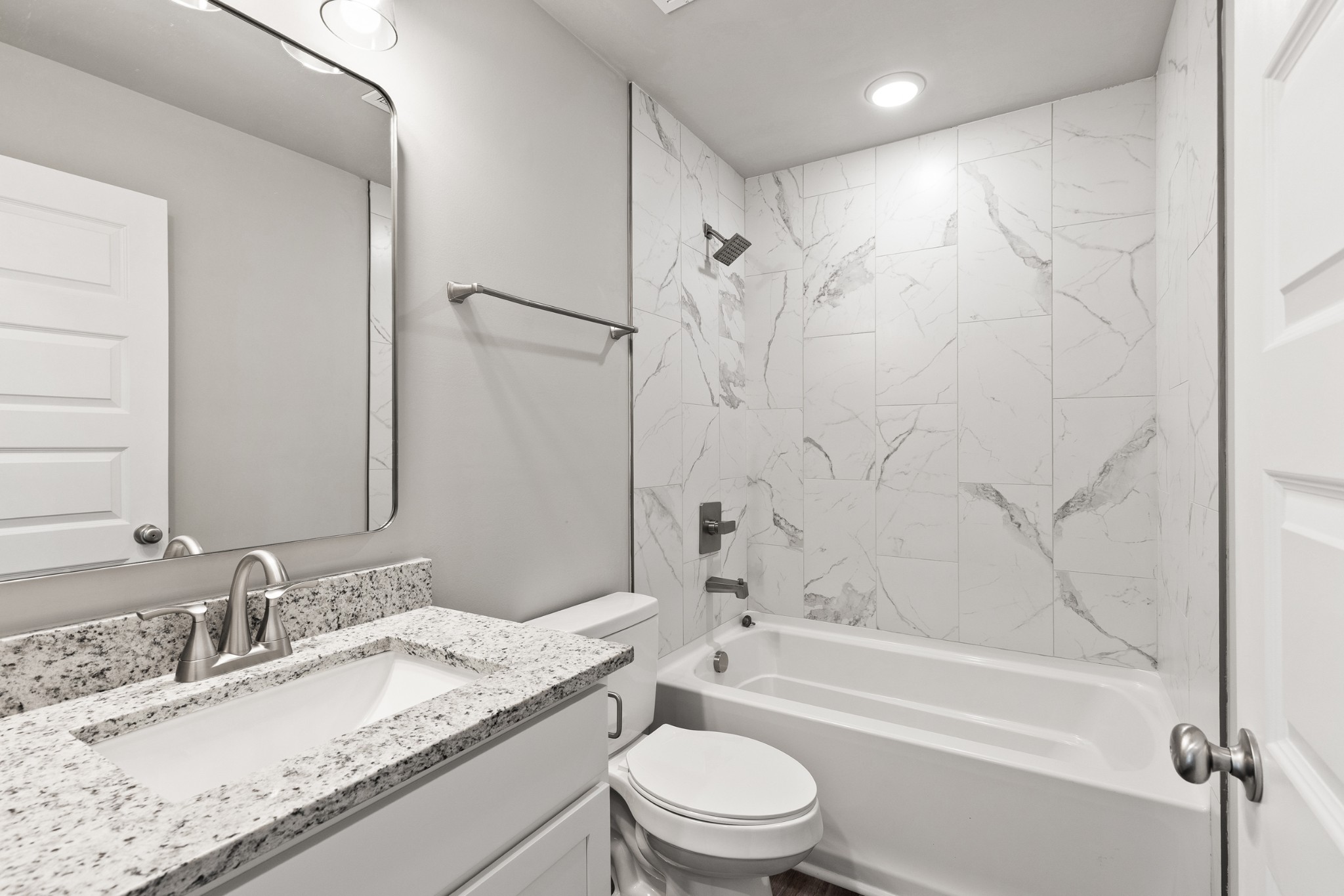 232 Franklin Street Pleasant View, TN 37146 - Photo 30 of 49 a bathroom with a granite countertop sink a toilet and shower