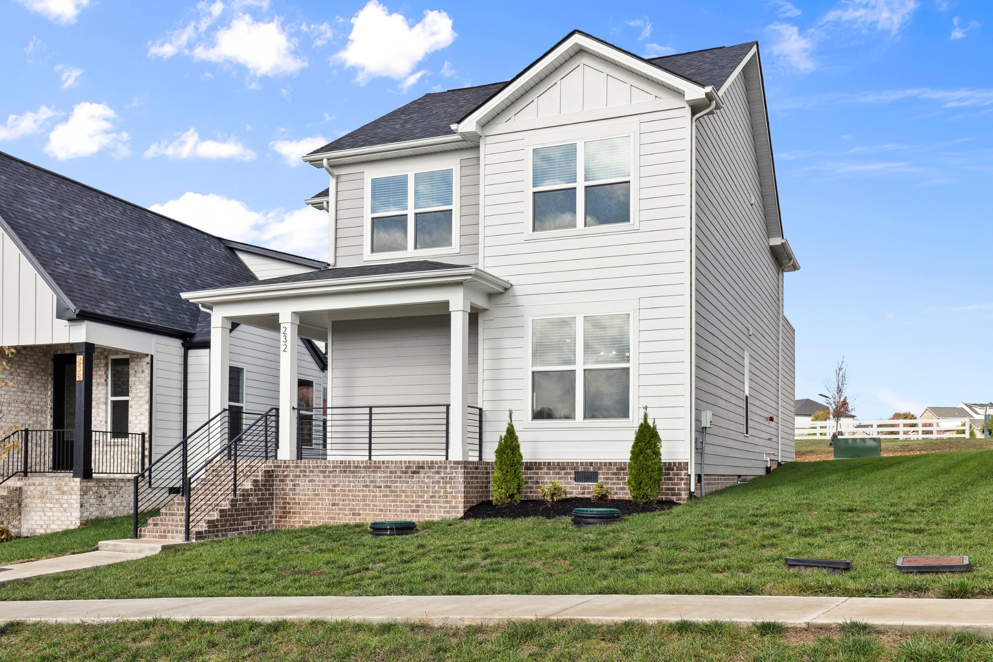 232 Franklin Street Pleasant View, TN 37146 - Photo 3 of 49 a front view of a house with a yard