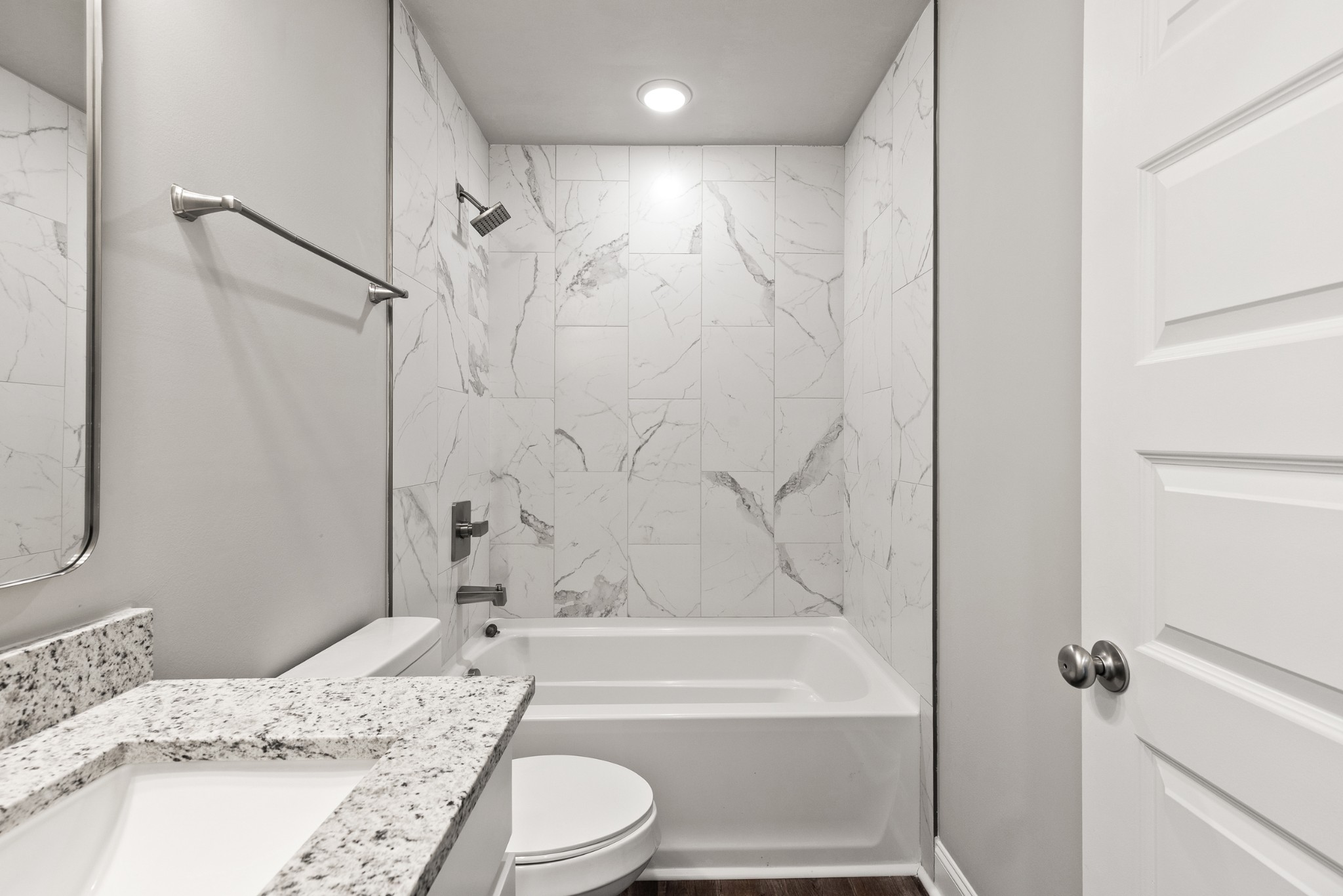 232 Franklin Street Pleasant View, TN 37146 - Photo 31 of 49 a bathroom with a granite countertop bathtub shower sink vanity and toilet
