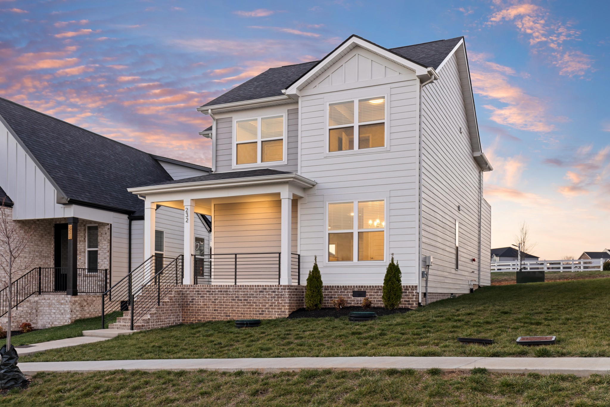 232 Franklin Street Pleasant View, TN 37146 - Photo 4 of 49 a front view of a house with a yard