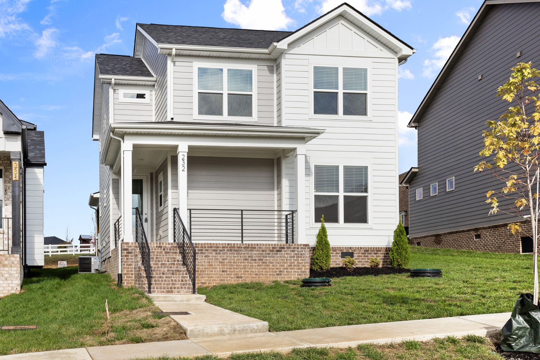 232 Franklin Street Pleasant View, TN 37146 - Photo 5 of 49 a front view of a house with a yard