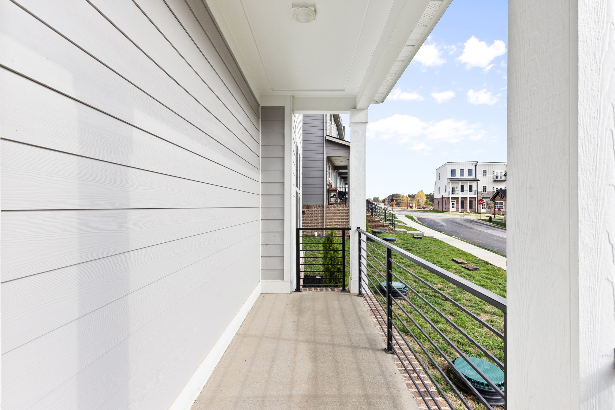 232 Franklin Street Pleasant View, TN 37146 - Photo 7 of 49 a balcony with a rug