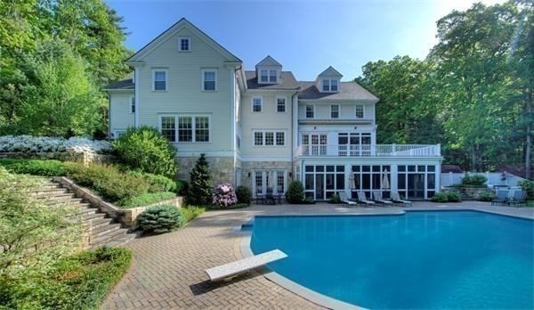 25 Bridle Pth Path Weston, MA 02493 - Photo 2 of 32 front view of a house with a yard