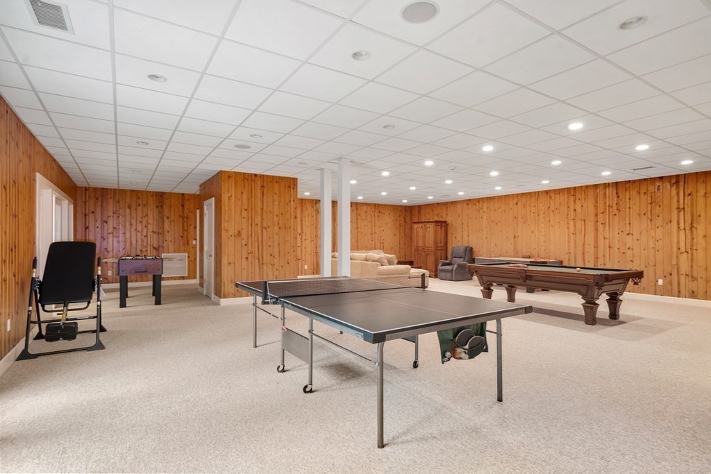 25 Bridle Pth Path Weston, MA 02493 - Photo 24 of 32 a room with furniture and air hockey table