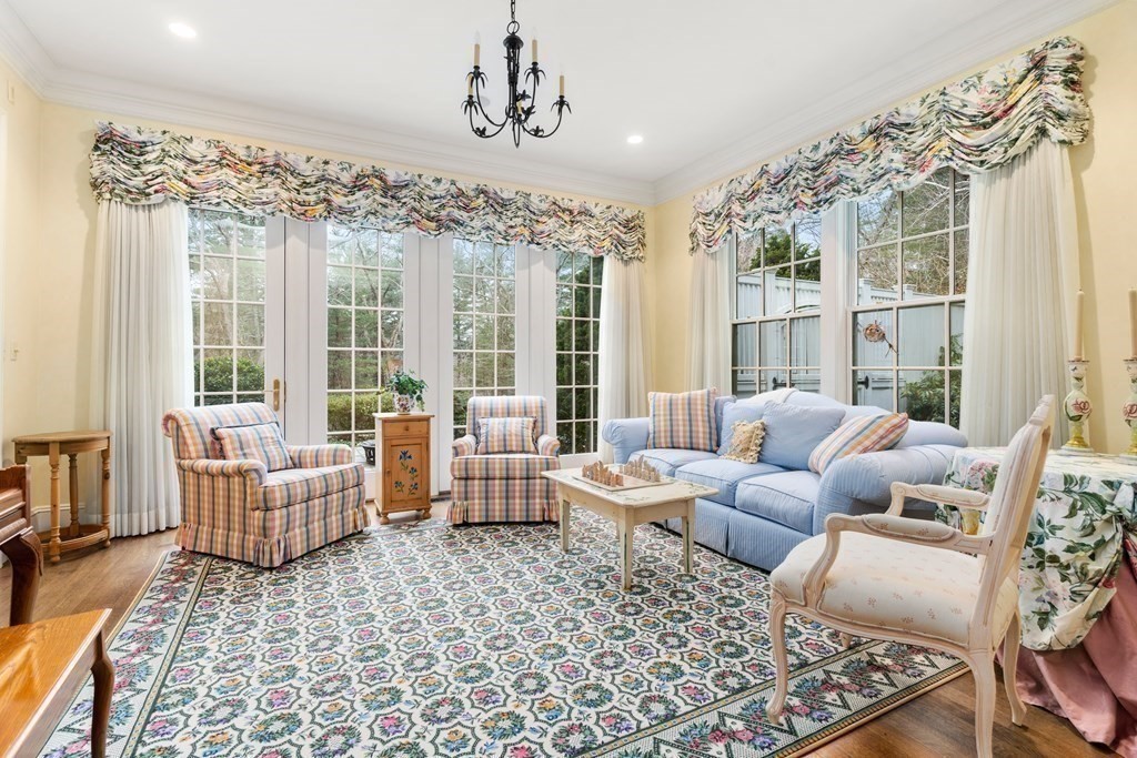 25 Bridle Pth Path Weston, MA 02493 - Photo 5 of 32 a living room with furniture and a large window