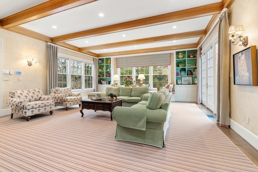 25 Bridle Pth Path Weston, MA 02493 - Photo 8 of 32 a living room with furniture and a large window