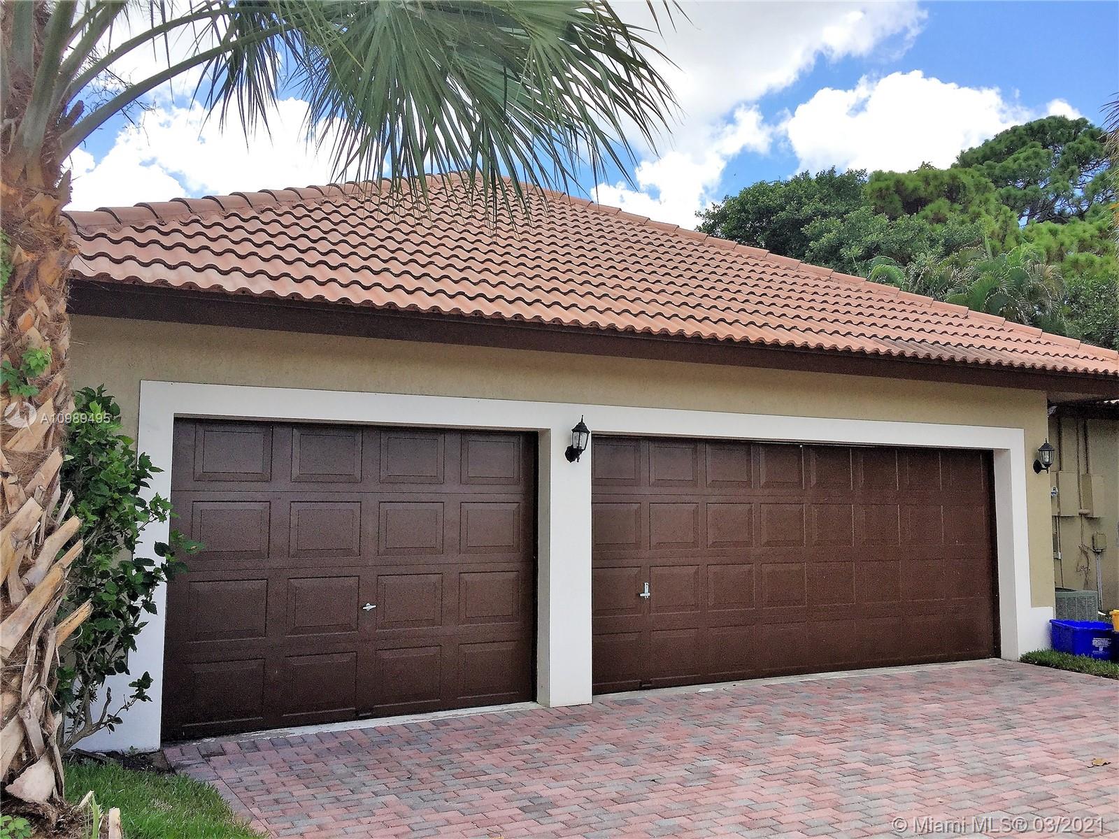 1405 Addison Avenue Boca Raton, FL 33486 - Photo 22 of 24 a front view of a house