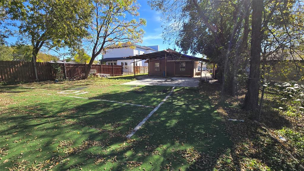 1441 Oakley Avenue Dallas, TX 75216 - Photo 30 of 34 a view of a house with a yard