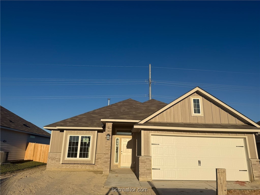 215 Whaley Street Caldwell, TX 77836 - Photo 1 of 14 a front view of a house with a yard