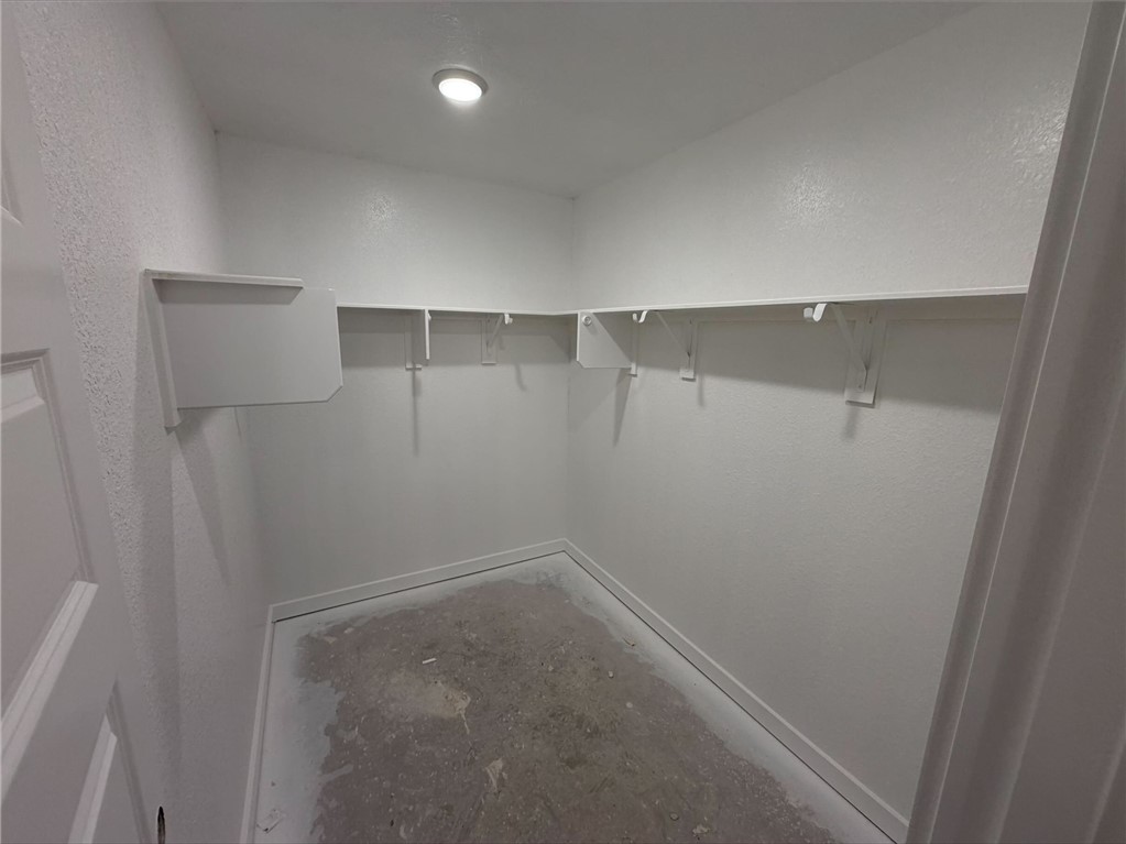 215 Whaley Street Caldwell, TX 77836 - Photo 4 of 14 a view of an empty walk in closet