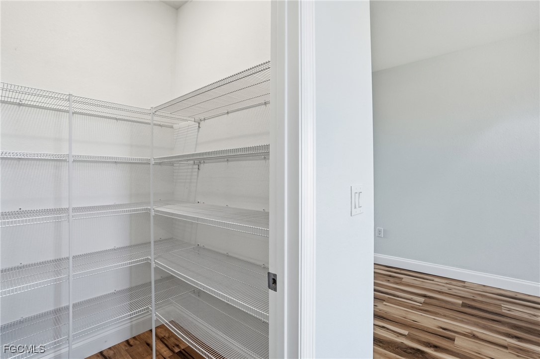 518 Braelyn Street LaBelle, FL 33935 - Photo 21 of 39 a view of an empty walk in closet