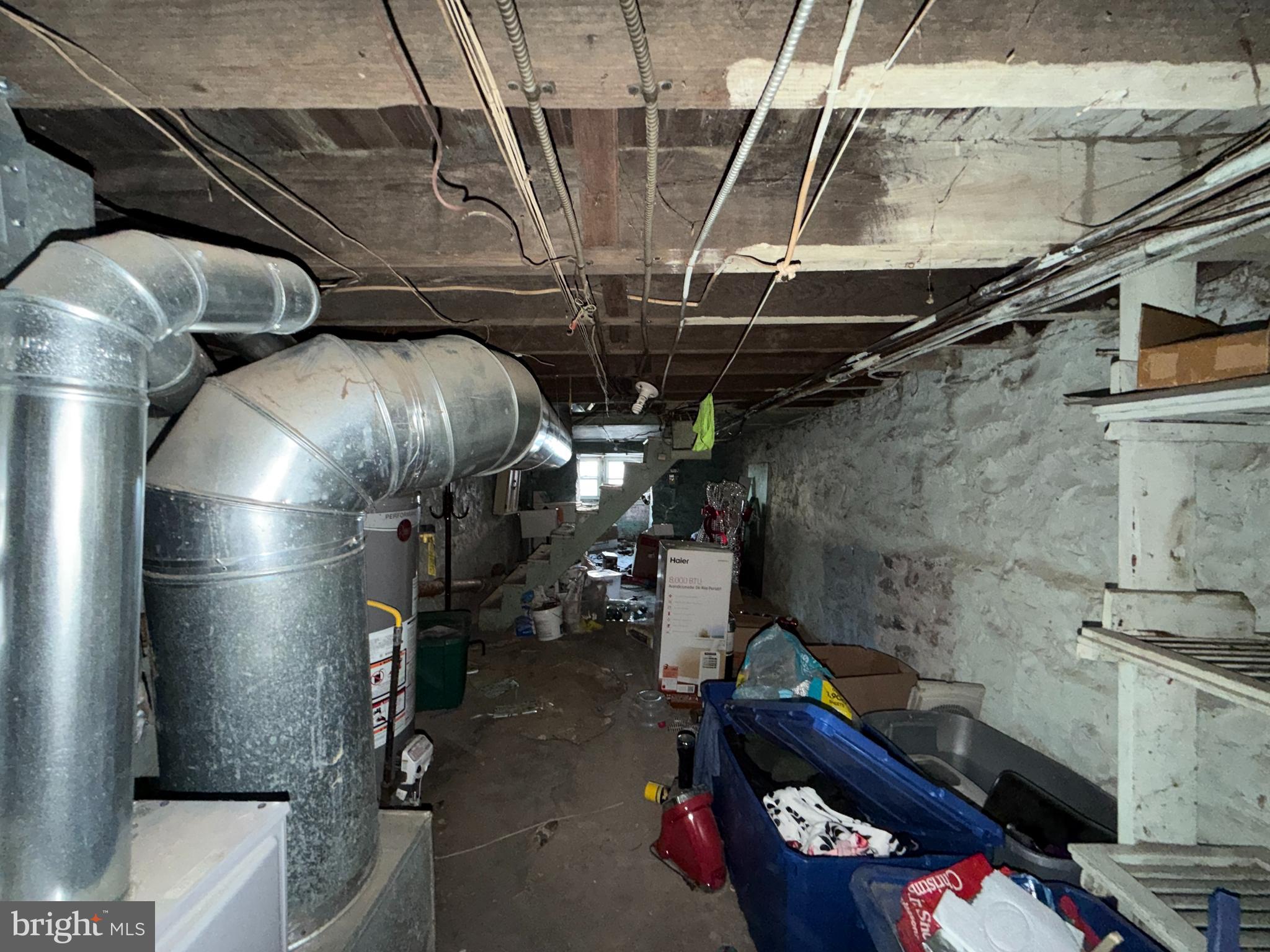 910 North Dukeland Street Baltimore, MD 21216 - Photo 25 of 27 a room with storage and utility