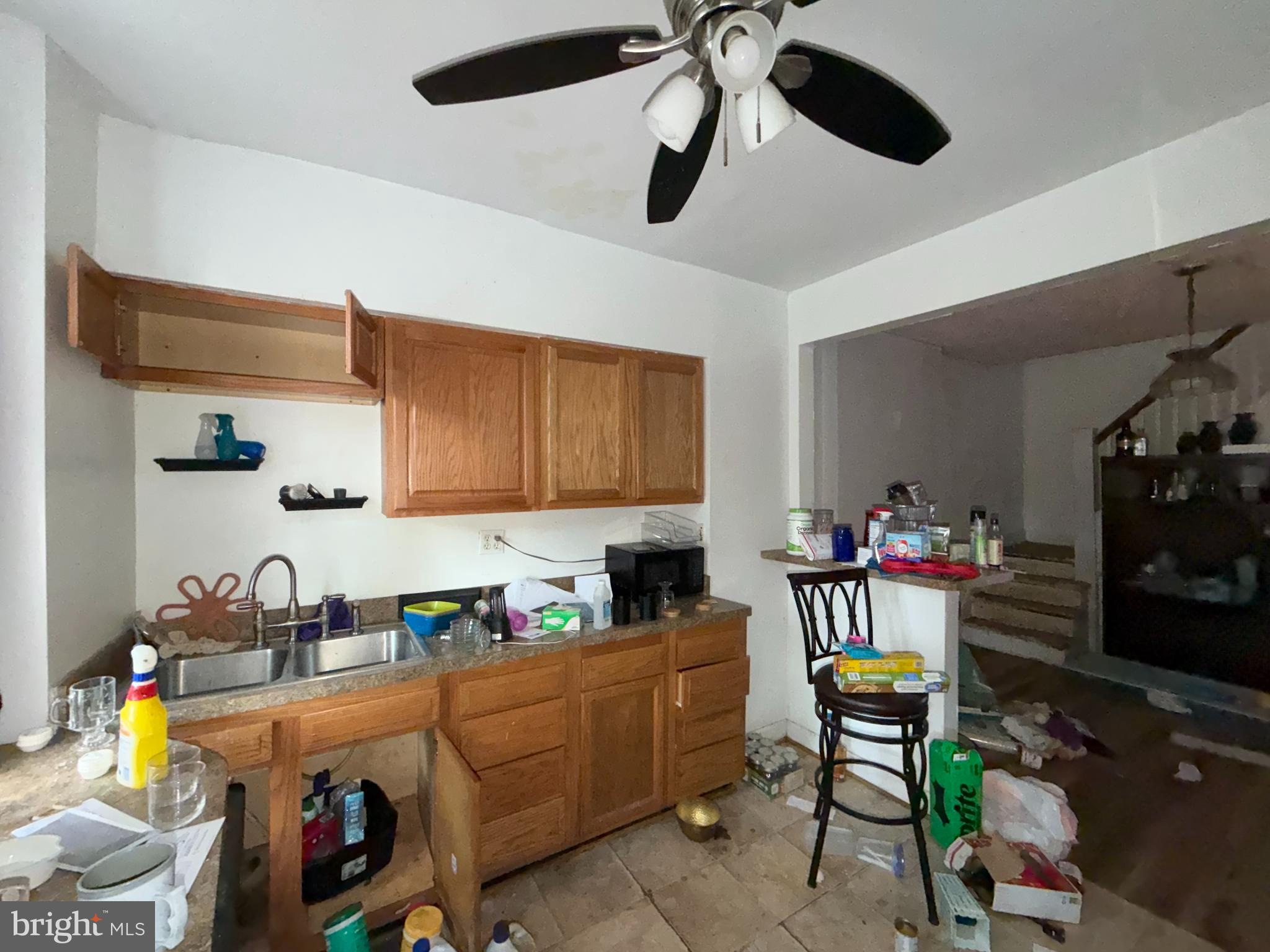 910 North Dukeland Street Baltimore, MD 21216 - Photo 9 of 27 a room with storage and utility