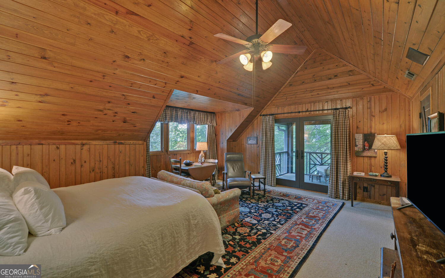 3540 Lake Rabun Road Lakemont, GA 30552 - Photo 35 of 81 a bed sitting in a spacious bedroom next to a window