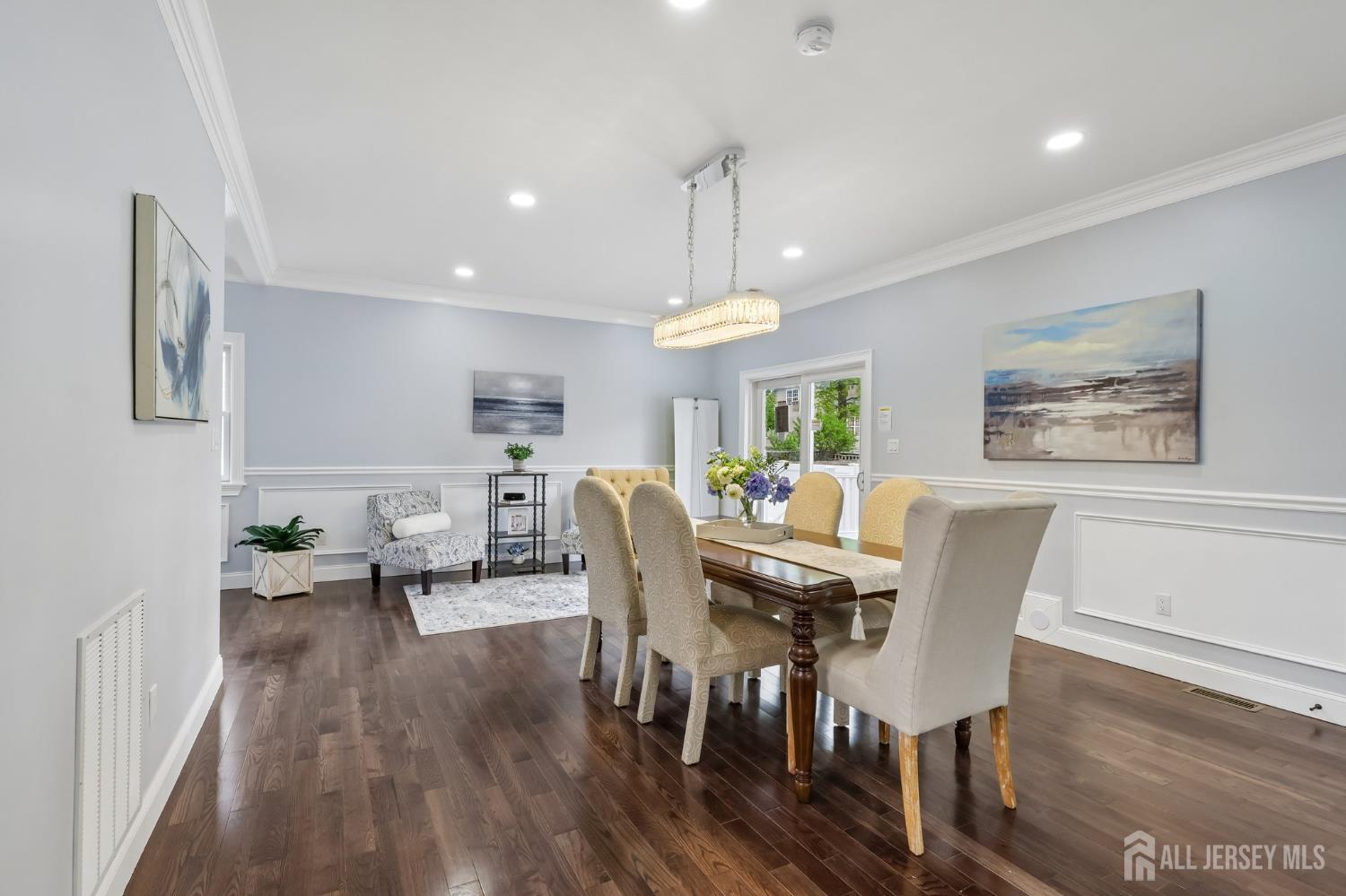 239 Suttons Lane Edison, NJ 08817 - Photo 13 of 68 a view of a dining room with furniture window and wooden floor