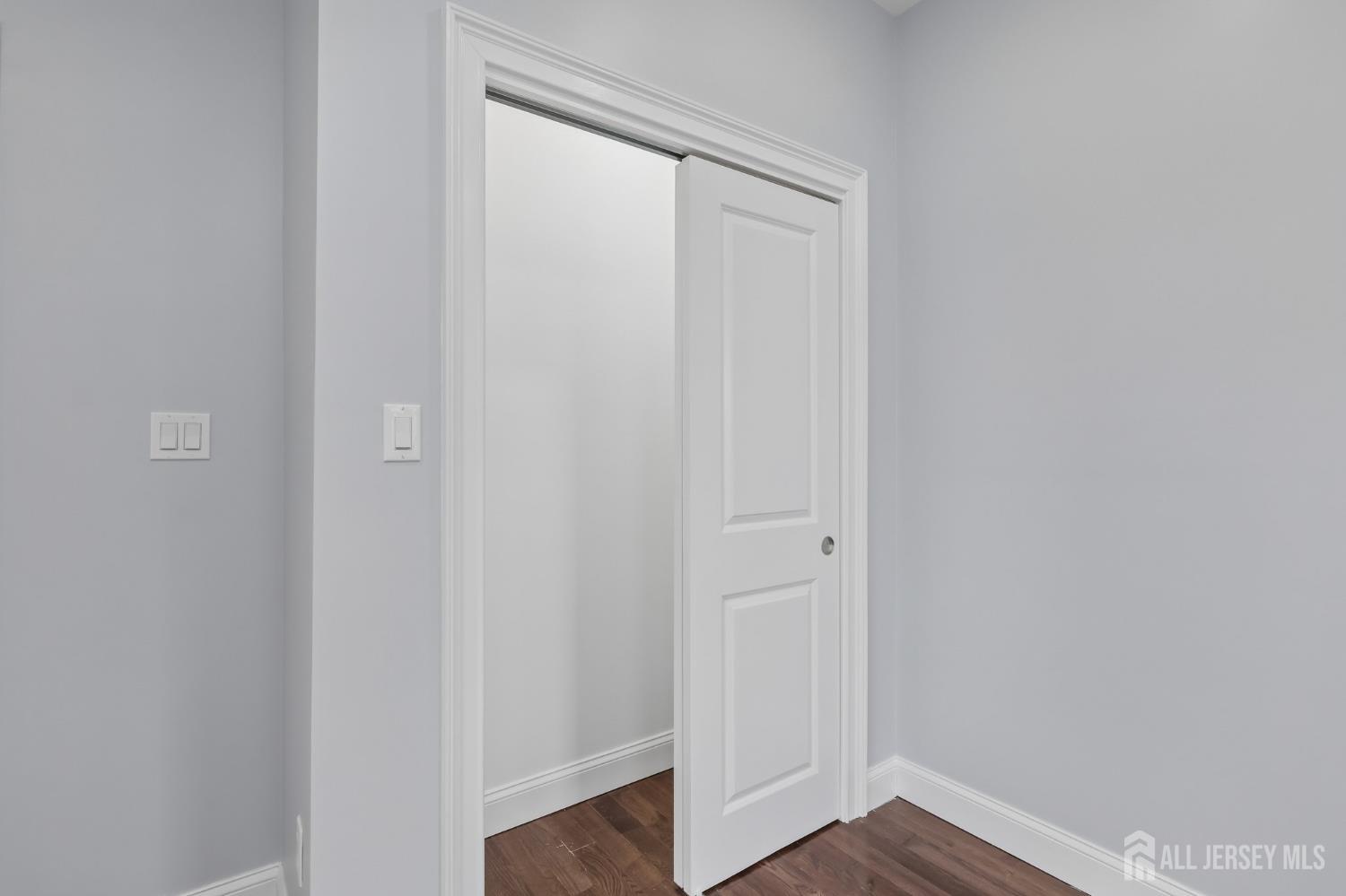 239 Suttons Lane Edison, NJ 08817 - Photo 34 of 68 a view of front door with wooden floor